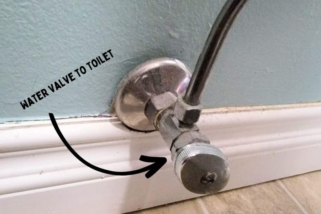 image showing how to cut off the water supply to a flooding upstairs toilet