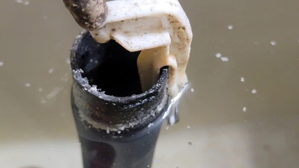 Image showing an overflow tube in a toilet tank that isn't holding water