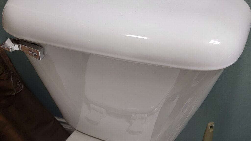 image of toilet tank that won't hold water