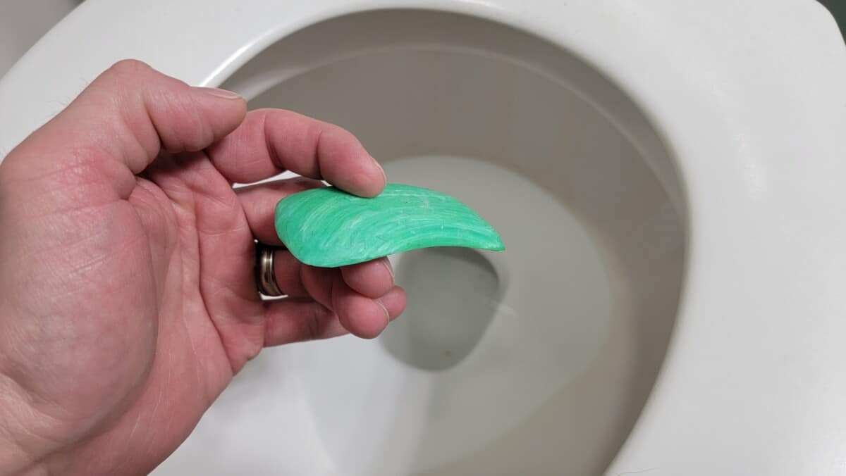 image of a bar of soap being flushed