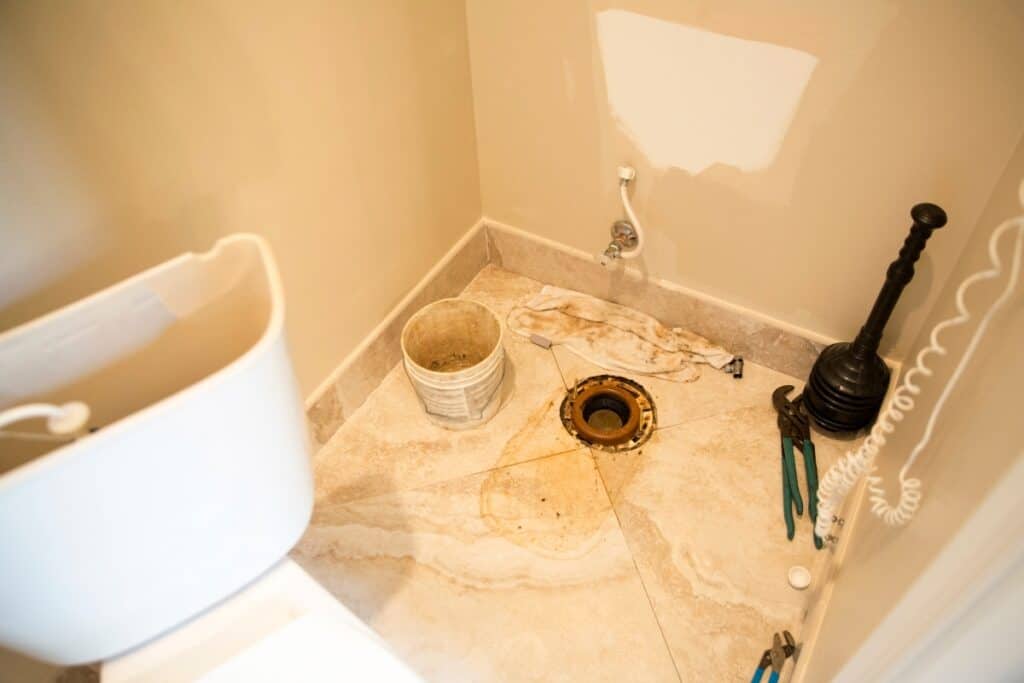 image of the toilet flange with the toilet removed from the floor.